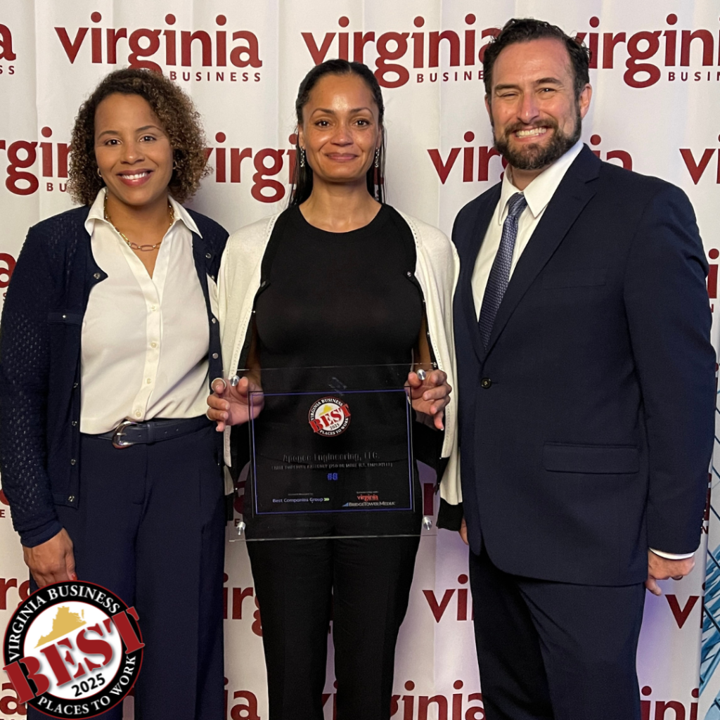 Apogee team members, Amber Forti, Anitra Simmons, and Cord Cohee accept the award for being a Best Place to Work in Virgina